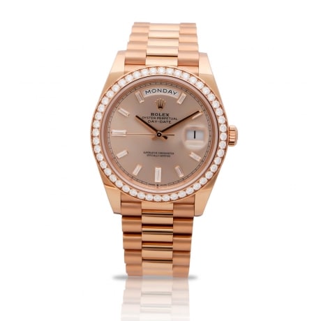 Rolex day date in rose gold with diamonds bezel