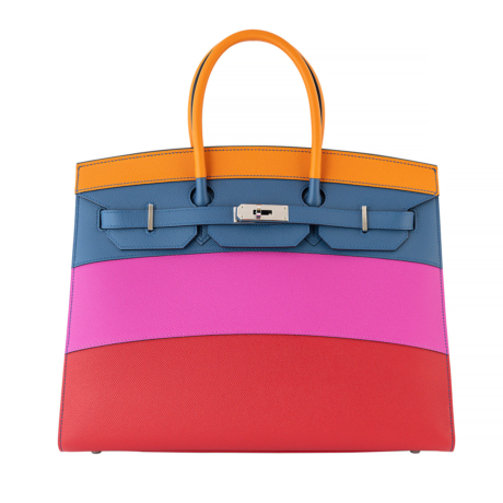 Front view of the bag showing horizontal strips of colour, red, fuchsia, blue and orange with silver hardware.