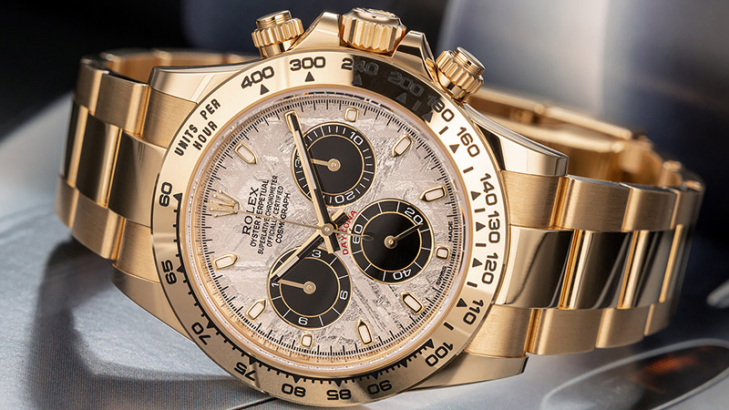 Gold Rolex Daytona Watch