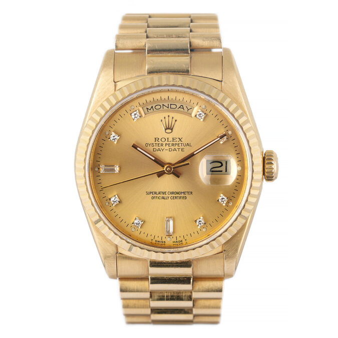 gold rolex with baguette diamond markers
